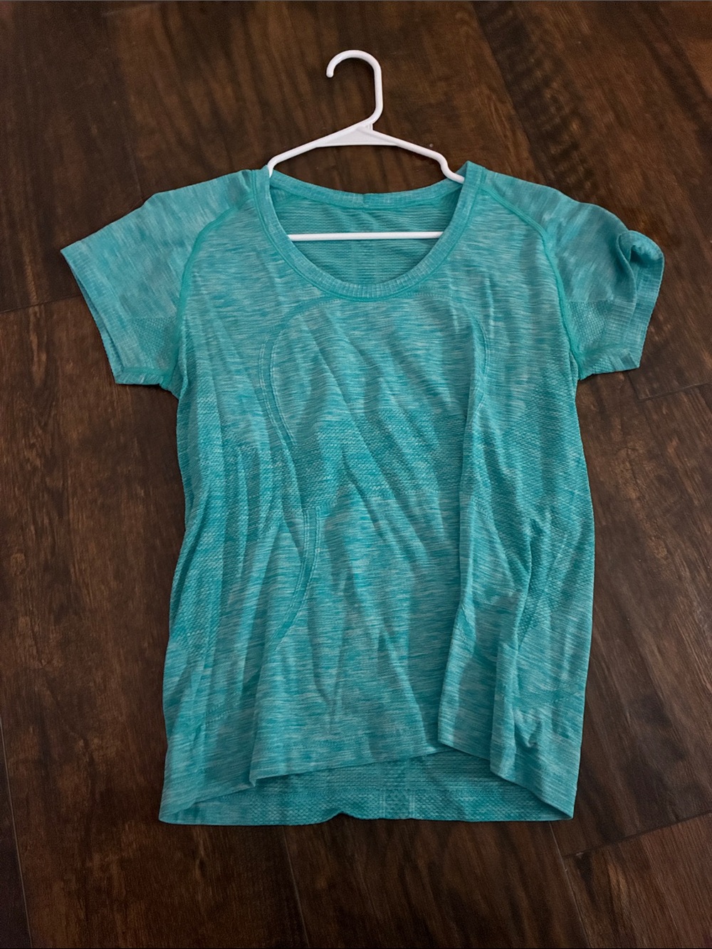 Women’s teal lulu lemon swiftly tech